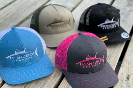Stop by Fresh catch Seafood in Wanchese and for one of our company logo hats. 